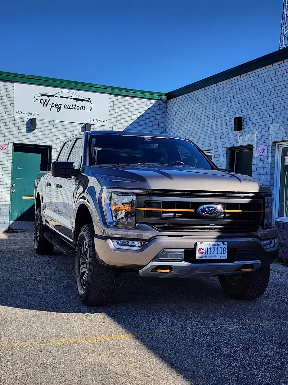 Ford F-150 Tremor with ceramic window tint for heat rejection parked at WPEG Customs on Pacific Avenue in Winnipeg
